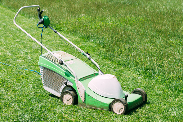 Electric lawn mower on Stock Photo by ivankmit | PhotoDune