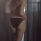 Gorgeous Young Sexy Girl in Black Panties Goes Towards the Bed - VideoHive Item for Sale