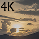 Sunset Over Hill and Fluffy Clouds - VideoHive Item for Sale