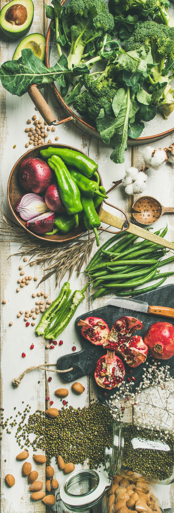 Winter vegetarian food cooking ingredients over white background - Stock Photo - Images