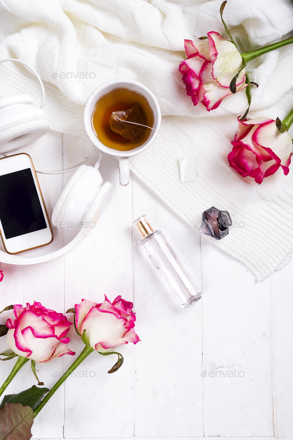 Fresh rose with tea and perfum - Stock Photo - Images