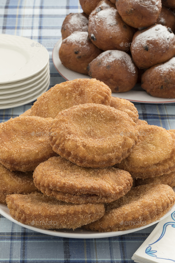 Dish with appelflappen, a traditional Dutch pastry for New Year' - Stock Photo - Images