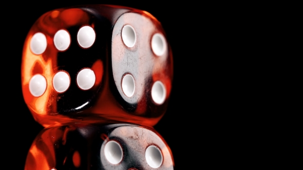 Rotating Red Dice Around Its Axis, On A Black Background, Stock Footage