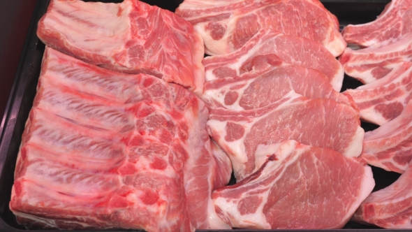 Showcase in the Store. Meat Pork, Beef, Poultry.  in Retail. alt