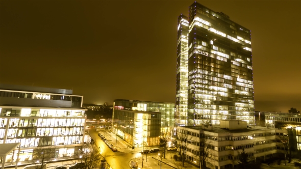 Aerial  of Business Skyscrapers Lights Going on and Off alt