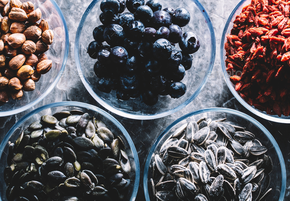 Five glass bowls of different superfoods. - Stock Photo - Images