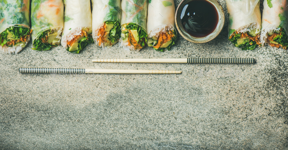 Vegan spring rice paper rolls over concrete background, copy space - Stock Photo - Images