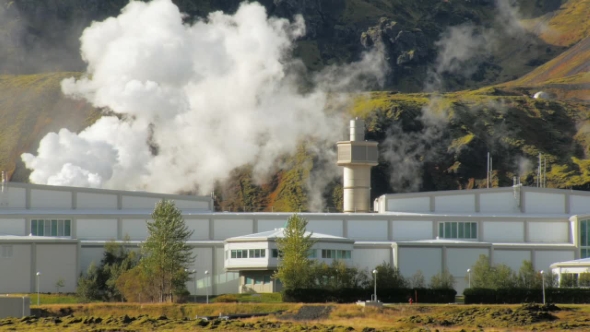Complex of Buildings of Geothermal Power Station in Countryside in Iceland, Near Foothills