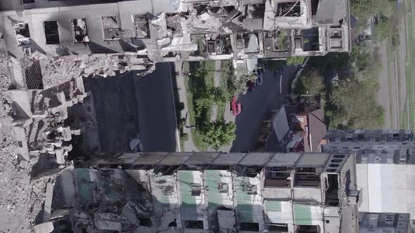 Vertical Video of a Multistorey Building Destroyed During the War in Ukraine alt
