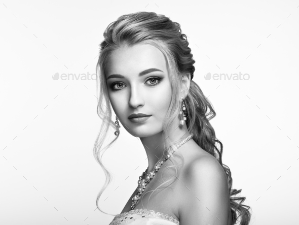 Blonde girl with long and shiny curly hair - Stock Photo - Images