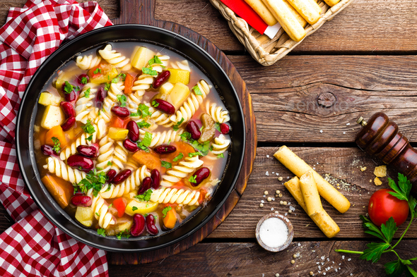 Minestrone soup. Vegetable soup with pasta - Stock Photo - Images