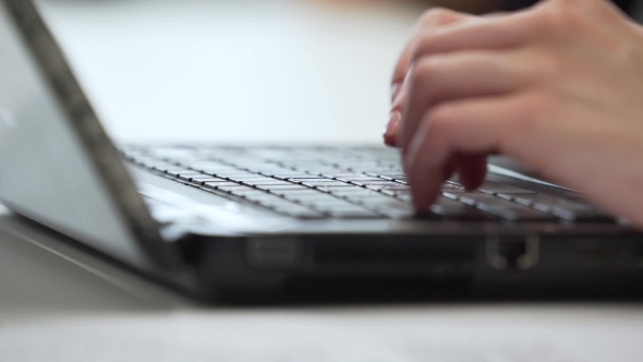 Office Worker Uses Laptop