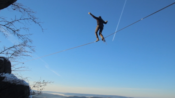 Ropewalker Poised Over the Abyss.