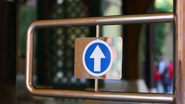 Entering Through Turnstile