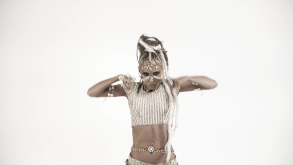 Oriental Beautiful Girl Dancing on a White Background