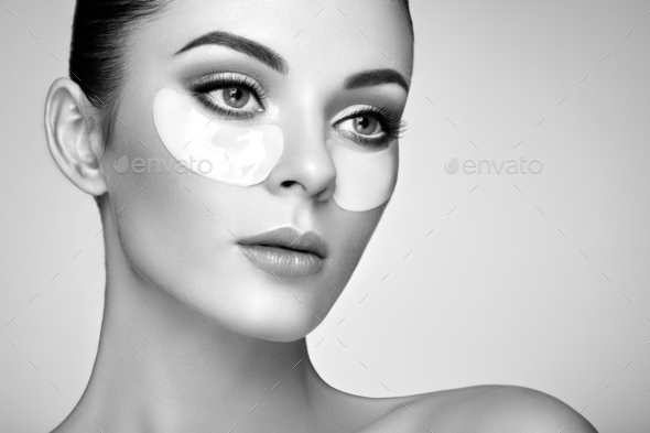 Portrait of Beauty woman with eye patches - Stock Photo - Images