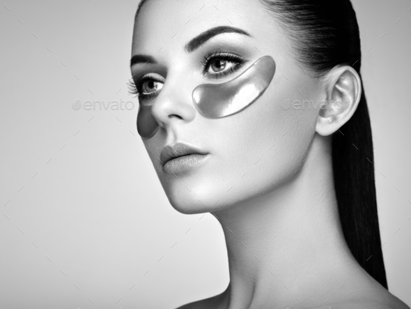 Portrait of Beauty woman with eye patches - Stock Photo - Images