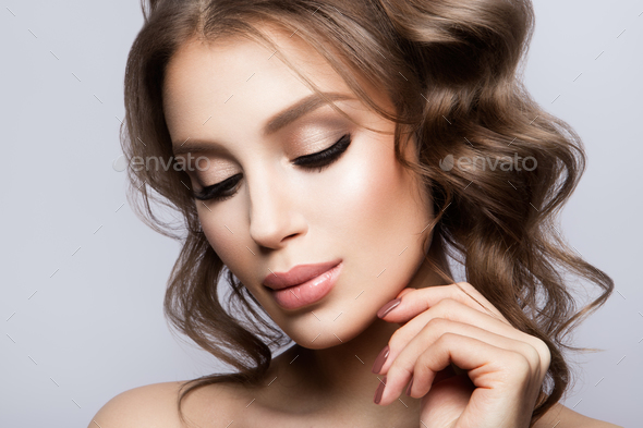 Beauty Woman face Portrait. Beautiful model Girl with Perfect Fresh Clean Skin - Stock Photo - Images