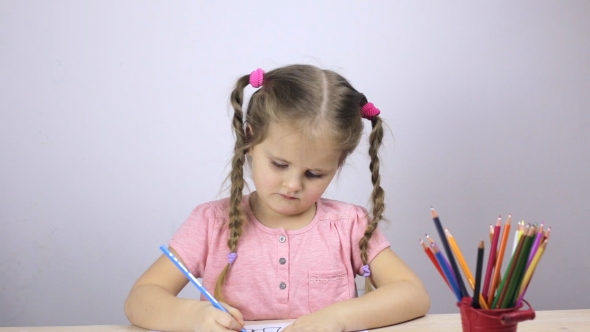 Beautiful Young Girl Draws with Pencils at Home. Education Concept