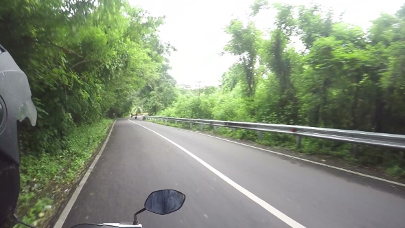 Riding by Beautiful Asian Green Nature Road by Motorbike