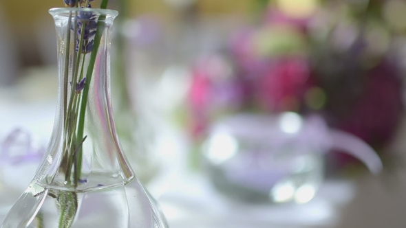Decorated Table for a Wedding Dinner with Flowers alt