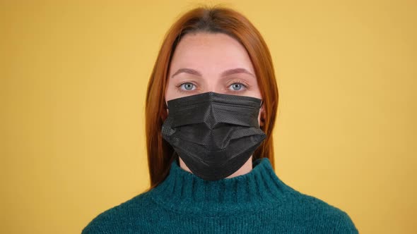Young Red Hair Woman Posing Isolated on Yellow Color Background Studio