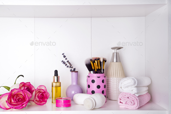 Composition with spa cosmetic, candles and brush for face, isolated on white - Stock Photo - Images