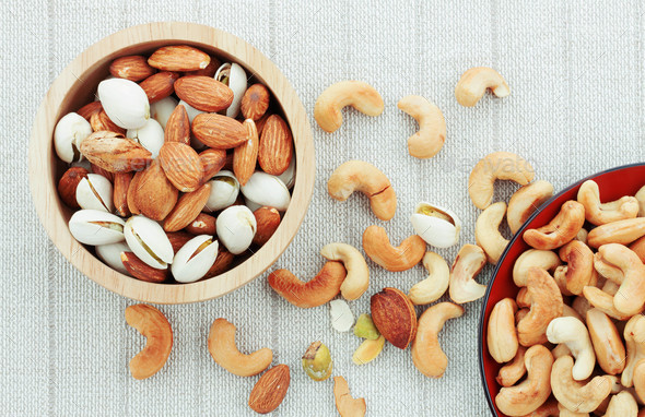 Cashew and almonds on tablecloth Stock Photo by start08 | PhotoDune