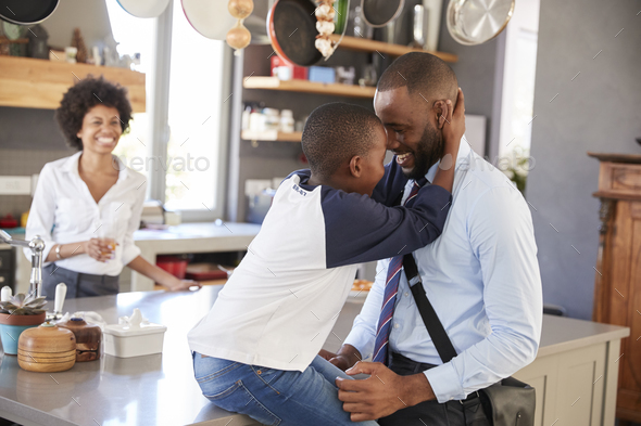 Father Saying Goodbye To Son As He Leaves For Work Stock Photo by monkeybusiness