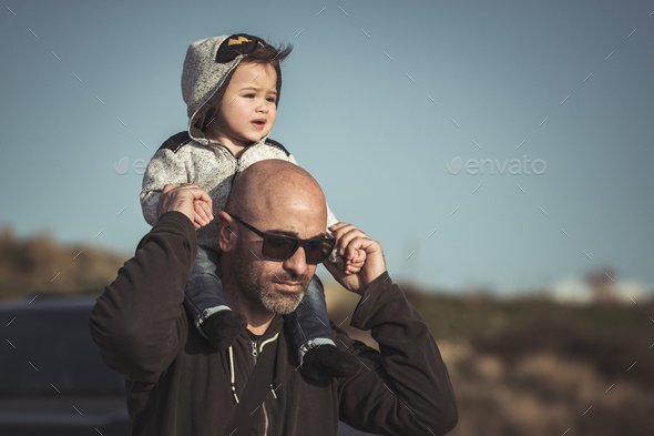 Father playing with his little son - Stock Photo - Images