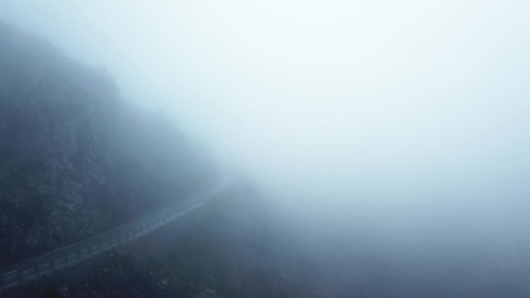 Mystical Views of the Road in Dense Fog in the Mountains of the Iberian Peninsula