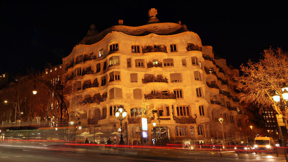 Casa Mila La Pedrera of Antoni Gaudi in Barcelona from Day to Night