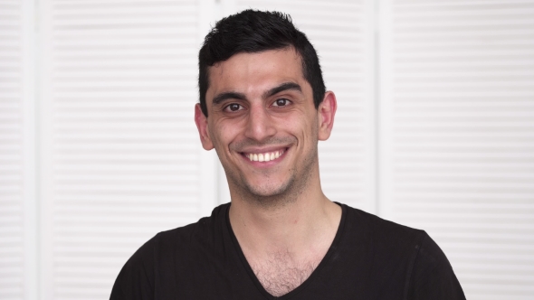 Young Happy Middle Eastern Man Smiling