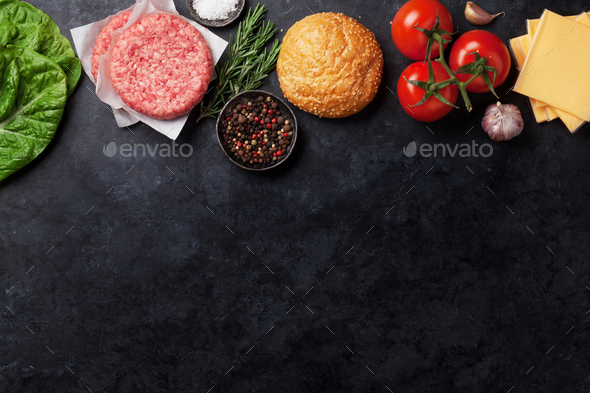 Raw minced beef meat and ingredients for burgers - Stock Photo - Images