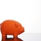 Businessman Hand Putting a Ethereum Coin in a Piggy Bank - VideoHive Item for Sale