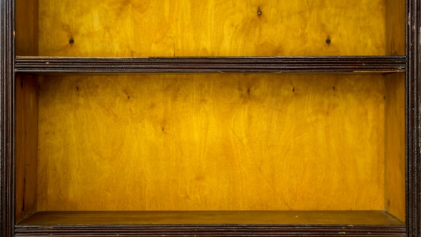 Filling of Shelves By Balls of Wool, Knitting Needles, Finished Woollen Fabrics alt