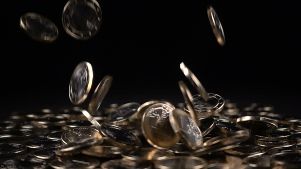 One Euro Coins Fall on a Black Background alt