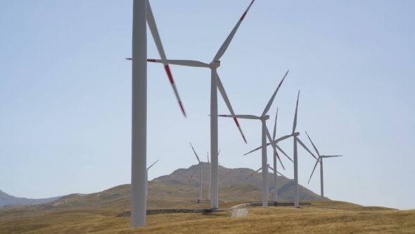 Windmills Converting Wind Energy into Electricity alt
