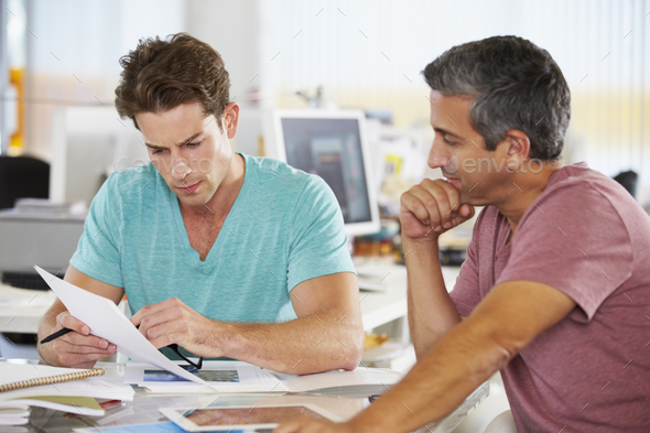 Two Men Meeting In Creative Office Stock Photo by monkeybusiness | PhotoDune