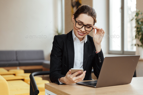 Young happy business lady work - Stock Photo - Images
