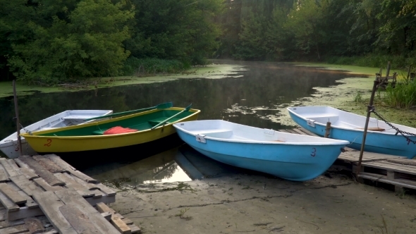 Boats on Riverbank