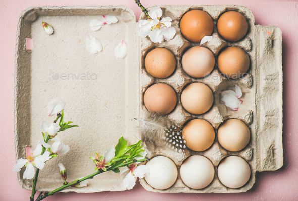 Natural colored eggs in box for Easter - Stock Photo - Images