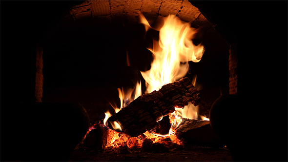 Fire Burns in a Fireplace