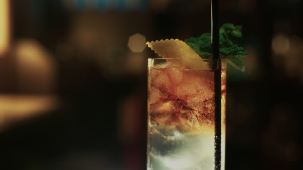 Professional Bartender Prepares Mojito Cocktail