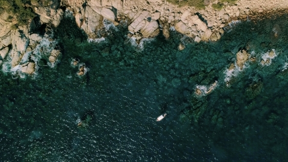 Amazing Epic Drone Shot of Bay Water with Boat alt