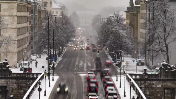 Traffic  During a Snow Storm in Munich, Germany alt