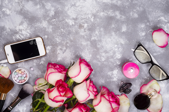 Roses and decorative cosmetics as frame - Stock Photo - Images