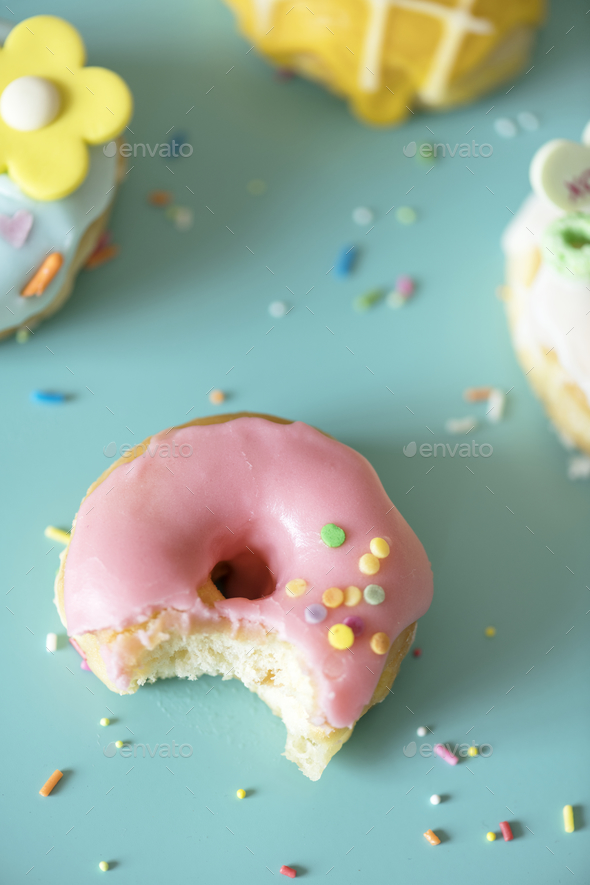 Closeup of bitten donut Stock Photo by Rawpixel | PhotoDune