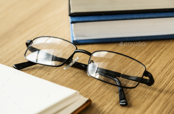 A pair of glasses and books educational, academic and literary concept Stock Photo by Rawpixel