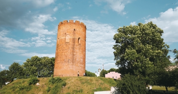 Kamyenyets, Brest Region, Belarus. Tower Of Kamyenyets In Sunny Summer Day With Green Grass alt